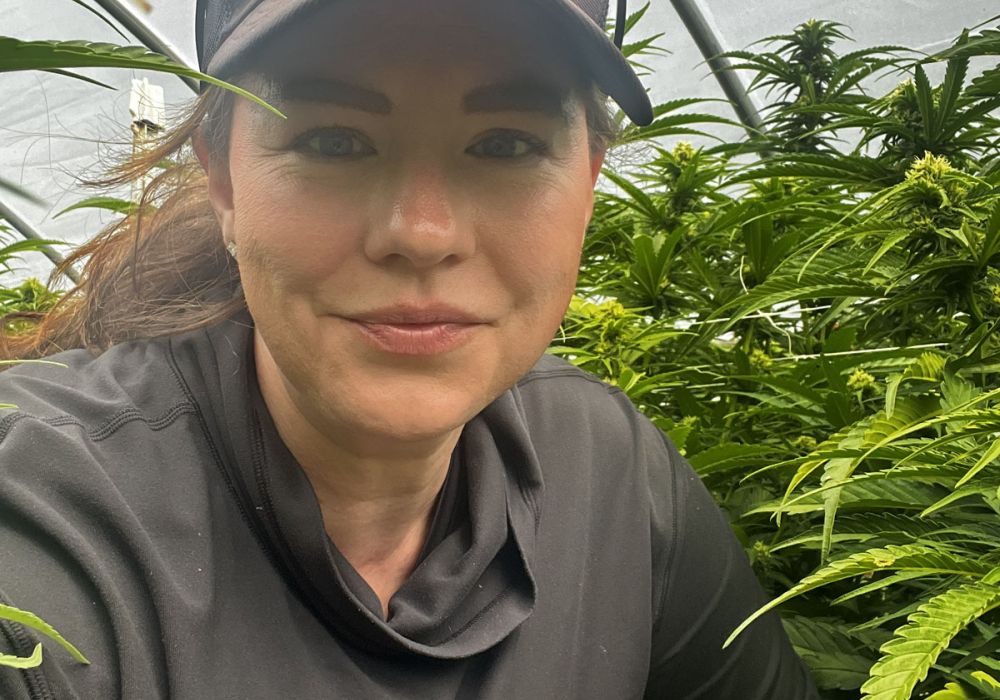 A Ganjier Guild member standing in a greenhouse